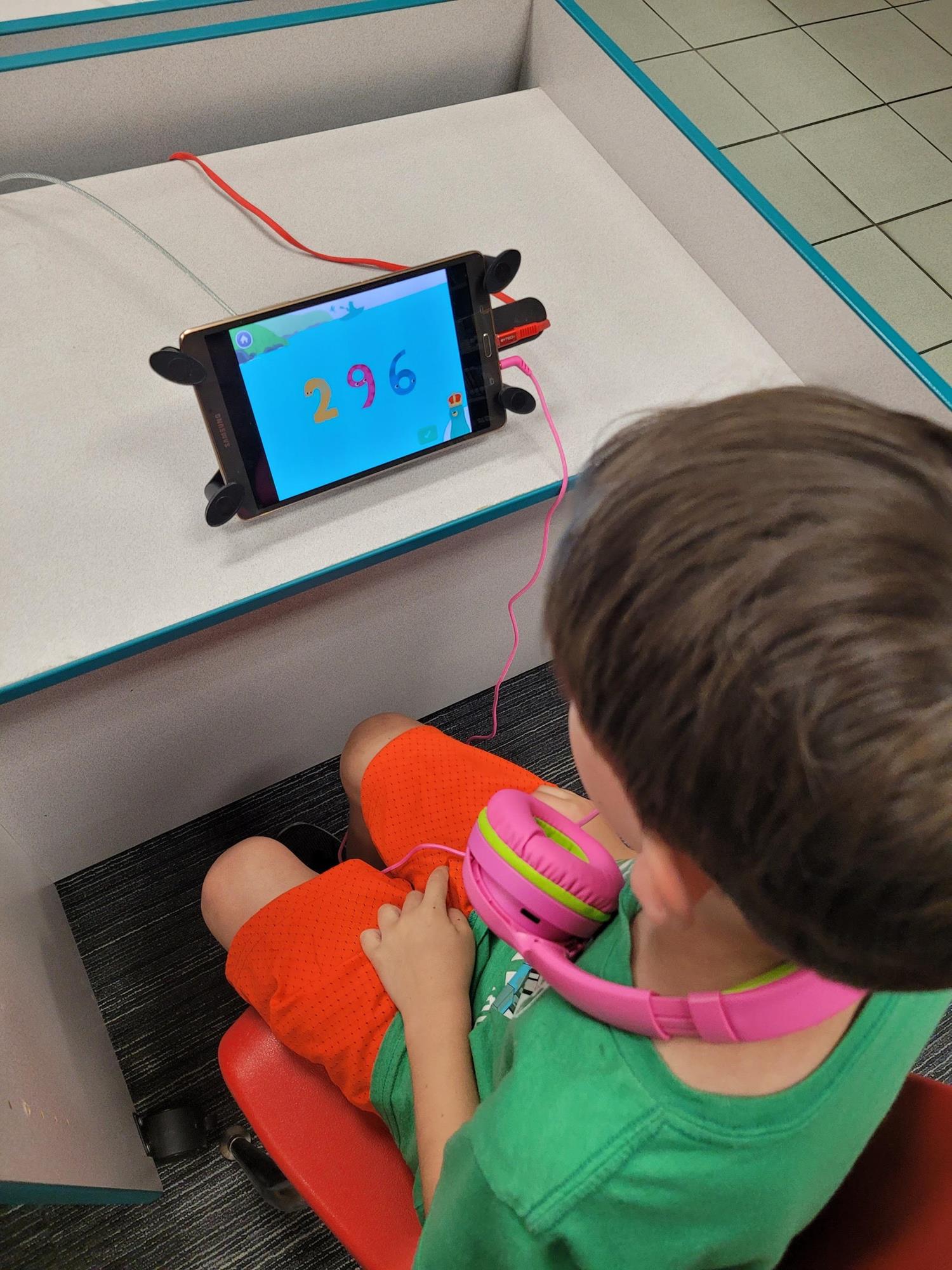 Kid at Early Learning Station